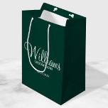 Modern Emerald Green Personalised Groomsman Medium Gift Bag<br><div class="desc">Personalised Groomsman Gifts
featuring personalised groomsman's name in white modern script font style with title and wedding date in modern sans serif font style on emerald green background.

Also perfect for best man,  father of the bride,  bridesmaid,  maid of honour,  mother of the bride and more.</div>