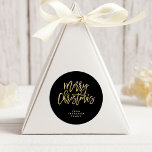 Modern Faux Gold Typography | Merry Christmas Classic Round Sticker<br><div class="desc">These stylish holiday stickers say "Merry Christmas" in trendy,  faux gold typography on a black background. Personalise with your name.</div>
