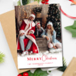 Modern Festive Red Christmas Stylish Family Photo  Holiday Card<br><div class="desc">Celebrate the season with our Modern Trendy Red Christmas Photo Holiday Card, beautifully decorated with delicate snowflakes and festive red calligraphy. This stylish card allows you to customise it with your own photo and family names, adding a personal touch to your holiday greetings. The elegant red script perfectly complements the...</div>