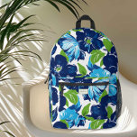 Modern Floral Blue and Green Monogram Printed Backpack<br><div class="desc">Add a burst of colour and flair to your everyday adventures with this stunning floral backpack. The bold navy and aqua blue flowers pop against a crisp white background, perfectly accented by vibrant green leaves for a fresh, tropical vibe. Designed for style and functionality, it features a spacious main compartment,...</div>