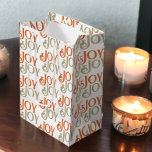 Modern Joy Christmas Medium Gift Bag<br><div class="desc">Modern muted sage green and orange Joy Christmas holiday gift bag from Ricaso</div>