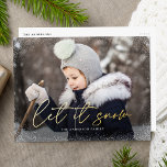 Modern Let it Snow Script Photo Foil Holiday Postcard<br><div class="desc">Wish friends and family a happy holiday with a foil holiday postcard! The postcard features your horizontal photo on the front with subtle snow flurries bordering the card. "Let it Snow" is displayed in a trendy gold foil calligraphy script with your family's name below. The foil holiday postcard reverses to...</div>