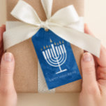 Modern Menorah Blue Hanukkah Gift Tag<br><div class="desc">This Happy Hanukkah gift tag features modern and fun menorah illustration that stands out against a textured background on blue (or ANY COLOR of your choice using the "customise it" button!). The backer is white with personalizable text in the "from" area for handy, pre-printed tags or you can clear the...</div>