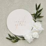 Modern Minimal Elegant Script Monogram Wedding Classic Round Sticker<br><div class="desc">Modern Minimal Elegant Script Monogram Wedding Classic Round Sticker Add a touch of elegance to your wedding with these modern, minimalist, and elegant script monogram classic round stickers. Crafted in classic boho (white linen) and Muesli colours, these stickers are perfect for sealing invitations, favour bags, or adding a personalised touch...</div>