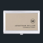 Modern Minimal Monogram Beige Business Card Holder<br><div class="desc">Modern minimalist design with simple beige and black monogram medallion with personalised name and title or custom text below in classic block typography on a solid beige background. Personalise for your custom use.</div>
