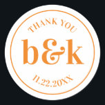 Modern Minimal Monogram Initials Orange Wedding Cl Classic Round Sticker<br><div class="desc">Modern,  minimal,  minimalist wedding design with big bold letters in orange tone colour (colour,  font,  text,  size can be changed).  Thank you  with date and bride and groom monograms (initials).  Perfect for that young couple; fall/autumn wedding.</div>