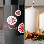 Modern Minimal Nordic Black Red White Christmas<br><div class="desc">Enhance the sophistication of your festive gatherings by incorporating this personalised Christmas wine label. The label is adorned with three charming red and white snowflakes, suspended like delicate ornaments against a sophisticated black backdrop. The festive greeting "Merry Christmas" is beautifully scripted in a modern font, inviting warmth and cheer. Below...</div>