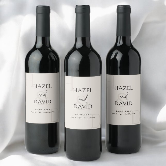 Modern Minimalist Black and Ivory Monogram Wedding Wine Label (Modern minimalist black and ivory monogram wine label adds a soft, elegant touch to tables.)