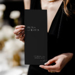 Modern Minimalist Black & White Wedding Program Programme<br><div class="desc">Featuring a clean minimalist layout and elegant typography, this double-sided card includes all the key moments of your ceremony and a detailed wedding party list. Perfect for couples who love timeless design with a modern edge. Fully customisable to fit your wedding details. Coordinates with the full "Elena" wedding suite —...</div>