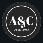 Modern Minimalist Monogram Wedding Round Stickers<br><div class="desc">Typographic minimalist bride and groom monogram with wedding date round stickers. Black with large white text and white circle border.</div>