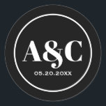 Modern Minimalist Monogram Wedding Round Stickers<br><div class="desc">Typographic minimalist bride and groom monogram with wedding date round stickers. Black with large white text and white circle border.</div>