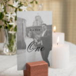 Modern Minimalist Monogram Wedding Table Number<br><div class="desc">Our Modern Minimalist Monogram Wedding Table Number offers a sleek and sophisticated addition to your wedding decor. With its minimalist script design and personalised monogram, this table number adds an elegant touch to each table setting. Crafted to complement modern wedding aesthetics, this table number enhances the overall ambiance of your...</div>