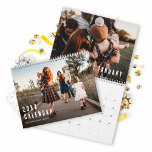 Modern Minimalist Typography Family Photo Calendar<br><div class="desc">Stay organised and inspired all year long with our Personalised Calendar. Featuring a bold sans-serif typeface for the year and a typewriter font for your family name that can easily be customised! Personalise with your own details as well as your treasured photos for each month.</div>