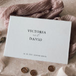 Modern Minimalist Wedding Gold Foil Guestbook<br><div class="desc">This modern minimalist wedding gold foil guest book is perfect for a simple wedding. The simple and elegant design features classic and fancy script typography in gold foil. 

Customise the front cover and spine to include the names of the bride and groom and the wedding date.</div>