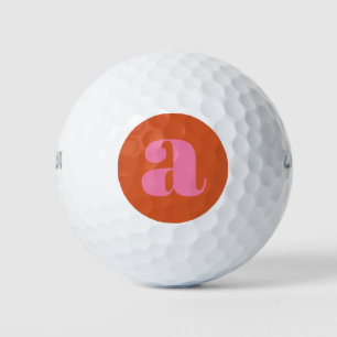 Modern Monogram Initial Letter Pink and Orange  Golf Balls