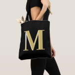 Modern monogram typography gold black tote bag<br><div class="desc">Modern monogram typography gold black</div>