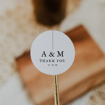 Modern Monogram Wedding Classic Round Sticker<br><div class="desc">Experience elegance with our minimalist monogram,  featuring the initials of both partners and a heartfelt "thank you" beneath. Elevate your wedding favours with this refined label or envelope closure.</div>