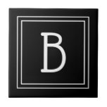 Modern Monogrammed Black & White Initial Simple Tile<br><div class="desc">Modern & Stylish personalised monogram added to decorative chic simple updated decorative tile in true black and white. Great gift idea! Easily customise with design tool to make it your own! Contact me at beachpausedesigns@gmail.com if you need help or have questions with this or any of our designs. Other design...</div>