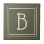 Modern Monogrammed Moss Green & Off White Initial Tile<br><div class="desc">Modern & Stylish personalised monogram added to decorative chic simple style decorative tile in moss green and off white. Great gift idea! Easily customise with design tool to make it your own! Contact me at beachpausedesigns@gmail.com if you need help or have questions with this or any of our designs. Other...</div>