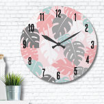 Modern Monstera Tropical Pattern Large Clock<br><div class="desc">This modern monstera leaf print,  graced with soothing pinks,  teal (almost a seafoam green),  white,  and grey,  invites a sense of tranquillity and contemporary elegance.  This pattern serves as a stylish and versatile addition to your life.  Trendy Modern Monstera Leaf Tropical Pattern Large Clock</div>