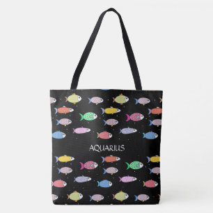Modern multicolored fish on black tote bag