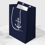 Modern Nautical Navy Blue Anchor Wedding Favour Medium Gift Bag<br><div class="desc">Modern Minimalist Nautical Navy Blue Anchor Wedding Favour Gift Bag
featuring white anchor and personalised bride and groom's name with wedding date in white modern sans serif font style on navy blue background.

Perfect for nautical themed wedding,  beach themed wedding and more.</div>