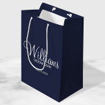 Modern Navy Blue  Personalised Groomsman Medium Gift Bag<br><div class="desc">Personalised Groomsman Gifts
featuring personalised groomsman's name in white modern script font style with title and wedding date in modern sans serif font style on navy blue background.

Also perfect for best man,  father of the bride,  bridesmaid,  maid of honour,  mother of the bride and more.</div>