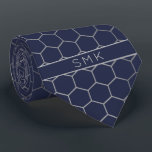 Modern Navy Blue Silver Foil Geometric Monogram Tie<br><div class="desc">Modern Navy Silver Foil Geometric Monogram Necktie in a stylish pattern of silvery grey hexagons on an elegant navy blue background. Easy to customise with text, fonts, and colours. Created by Zazzle pro designer BK Thompson © exclusively for Cedar and String; please contact us at cedarandstring@gmail.com if you need assistance,...</div>
