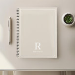 Modern Neutral Cream Beige Family Name Planner<br><div class="desc">Custom-designed planner notebook featuring classic modern family name monogram design on neutral earthy colour background.</div>