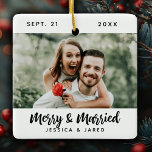 Modern Newlywed Merry and Married Photo Christmas Ceramic Ornament<br><div class="desc">A simple Merry & Married Christmas ornament with script typography and your photo. Personalise it with your name,  wedding date and photo. Back of ornament has a simple black and white plaid pattern. Designed for you by Blackberry Boulevard.</div>