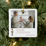 Modern Nutcracker Merry Christmas 2 Photo Family  Ceramic Ornament<br><div class="desc">This Modern Nutcracker Merry Christmas 2 Photo Family Ceramic Ornament is the perfect way to commemorate this holiday season with your family. With festive ‘Merry Christmas’ typography in red and a watercolor nutcracker adorning the front, your families name will stand out this Holiday season. Personalise your ornament with two of...</div>