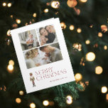 Modern Nutcracker Merry Christmas 3 Family Photo Card<br><div class="desc">Celebrate the holiday season with the Modern Nutcracker Merry Christmas 3 Photo Typography Card! This stunning card features a beautiful watercolor nutcracker set against a backdrop of festive typography in a rich burgundy hue. Personalise your 3 family photos and family name to make your card truly unique. Upon opening the...</div>