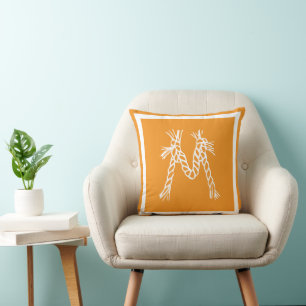 Modern orange coastal beach rope monogram cushion