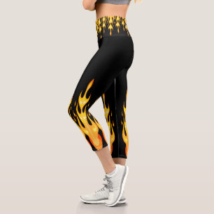 Modern orange yellow fire flames on black capri leggings