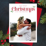 Modern Our First Christmas Newlywed Photo Holiday Card<br><div class="desc">The Modern Our First Christmas Newlywed Photo Holiday Card combines elegant typography with a modern design, beautifully showcasing your favourite photos to celebrate your first Christmas as newlyweds. With festive red accents, this card is the perfect way to share the joy of your newly married life—easily customisable to fit your...</div>