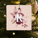 Modern Pastel Pink & Red Floral With Initial Ceramic Ornament<br><div class="desc">The Modern Pastel Pink & Red Floral With Initial design is a visually stunning and sophisticated combination of soft pastel pink hues and vibrant red tones. At the centre of the design is a customisable initial, adding a personal touch to the overall aesthetic. The initial is bold and prominent, standing...</div>