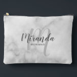 Modern Personalised Bridesmaid Monogram Name Accessory Pouch<br><div class="desc">Add a personal touch to your wedding with personalised bridesmaid gift. This design features personalised bridesmaid's name in grey modern script font style and monogram in light grey modern script font style as background with title in grey modern sans serif font style on white marble background. Also perfect for maid...</div>