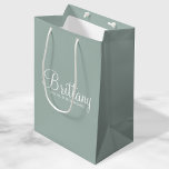 Modern Personalised Bridesmaid Proposal Medium Gift Bag<br><div class="desc">Modern Personalised Bridesmaid Proposal Gift Bag
featuring personalised bridesmaid's name in white modern script font style with title in modern sans serif font style on sage green background.

Also perfect for maid of honour,  flower girl and more.</div>