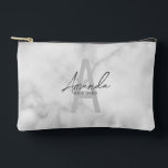 Modern Personalised Bridesmaid's Monogram and Name Accessory Pouch<br><div class="desc">Modern Personalised Bridesmaid's Monogram and Name Gifts This design features personalised bridesmaid's name in grey modern handwriting script font style and monogram in light grey modern sans serif font style as background, with wedding details in grey modern sans serif font style, on white marble background. Also perfect for maid of...</div>