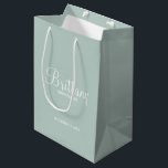 Modern Personalised Bridesmaids Name Medium Gift Bag<br><div class="desc">Modern Personalised Bridesmaids Gifts
featuring personalised bridesmaid's name in white modern script font style with title and wedding date in modern sans serif font style on sage green background.

Also perfect for Maid of Honour,  Flower Girl,  Mother of the Bride and more.</div>
