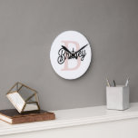 Modern Personalised Monogram and Name Pastel Pink Round Clock<br><div class="desc">Introducing our Modern Personalised Monogram and Name Pastel Pink Clock, a stylish addition to your home decor. This clock features a contemporary design in soft pastel pink, personalised with your monogram and name for a unique touch. Perfect for adding a personalised touch to any room, whether it's the living room,...</div>