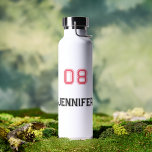 Modern Pink Black Player Name Jersey Number Sports Water Bottle<br><div class="desc">Create your own custom, personalised, cool, chic, modern, stylish pink and black typography / font / script, classy white, spill-proof, stainless steel, condensation-resistant exterior, monogrammed player name jersey number durable double-wall Thor Copper Vacuum Insulated Bottle that keeps beverages hot for 12 hours or cold for 48 hours. Simply type in...</div>