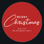 Modern Red And White Merry Christmas Script Name Classic Round Sticker<br><div class="desc">Add a pop of colour to your holiday wrapping and more with these Modern Red And White Merry Christmas Script Name Classic Round Stickers. Each is designed with text "Merry Christmas" in white letters on red. The font is hand script lettering mixed with simple easy to read letters. Personalised with...</div>