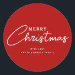 Modern Red And White Merry Christmas Script Name Classic Round Sticker<br><div class="desc">Add a pop of colour to your holiday wrapping and more with these Modern Red And White Merry Christmas Script Name Classic Round Stickers. Each is designed with text "Merry Christmas" in white letters on red. The font is hand script lettering mixed with simple easy to read letters. Personalised with...</div>