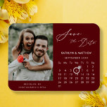Modern Red Elegant Script Photo Save the Date Magnet<br><div class="desc">Modern Maroon Red | Burgundy Elegant Script ‘Save the Date’ Magnet featuring Custom Calendar with a beautiful Photo. Let your family, friends and colleagues know that you have set a date for your wedding celebration with this elegant magnet. To move the Ring marker > click blue ‘Personalise’ > scroll down...</div>