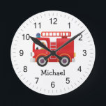 Modern Red Fire Truck Personalised Name Round Clock<br><div class="desc">This personalised fire truck clock is the perfect addition to any child's bedroom or playroom. The bold red design and customised name make it a fun, eye-catching way to keep track of the time. Kids will love seeing their name displayed on this classic fire truck-inspired clock. And parents will appreciate...</div>