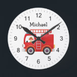 Modern Red Fire Truck Personalised Name Round Clock<br><div class="desc">This personalised fire truck clock is the perfect addition to any child's bedroom or playroom. The bold red design and customised name make it a fun, eye-catching way to keep track of the time. Kids will love seeing their name displayed on this classic fire truck-inspired clock. And parents will appreciate...</div>