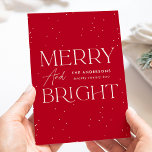 Modern Red Merry and Bright Non-Photo Holiday Card<br><div class="desc">Modern holiday card featuring "Merry and Bright" displayed in white lettering and red background with subtle white dots (snow). Personalize the front of the non-photo holiday card with your family name and the year in white lettering. The card reverses to display your personal message in red lettering or leave it...</div>