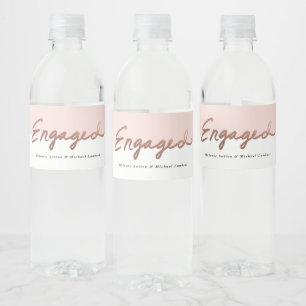 Modern Rose Gold Handwritten Engaged Water Bottle Label