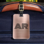 Modern Rose Gold Metal Two Monogram Initial Luggage Tag<br><div class="desc">Elegant Girly Stylish Modern Rose Gold Metal Two Monogram Initial Custom Personalised Personalised Luggage Bag Tag. This design featuring two (2) bold monogram initial typography font and the reverse side address info on Rose Gold Brushed metal (Rose gold metallic foil look) background. These are easy to customise it. Stylish gift...</div>